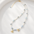 Powder Blue Crown Charm Necklace